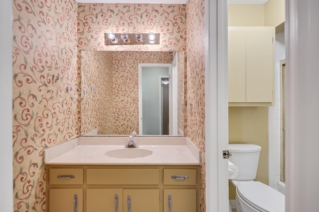 460 Jason Dr, Memphis, TN 38120 - bathroom with wallpapered walls and vanity