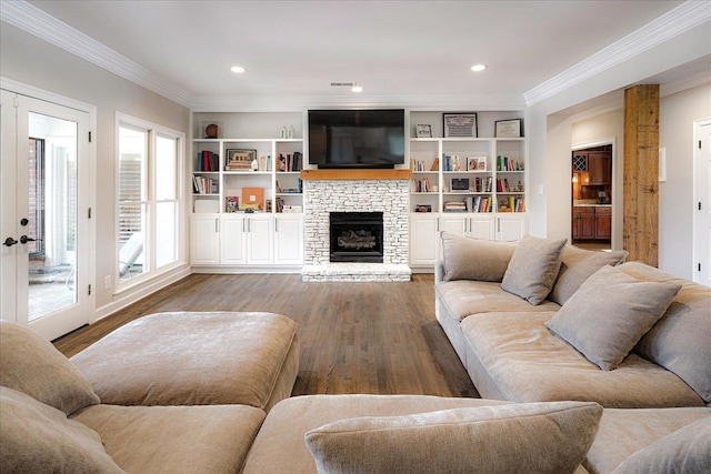 2165 Latting Hills Cv, Eads, TN 38016 - living room with ornamental molding, wood finished floors, a stone fireplace, recessed lighting, and built in shelves