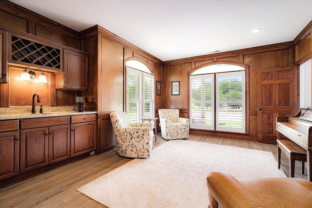 2165 Latting Hills Cv, Eads, TN 38016 - sitting room with light wood-style floors and wooden walls