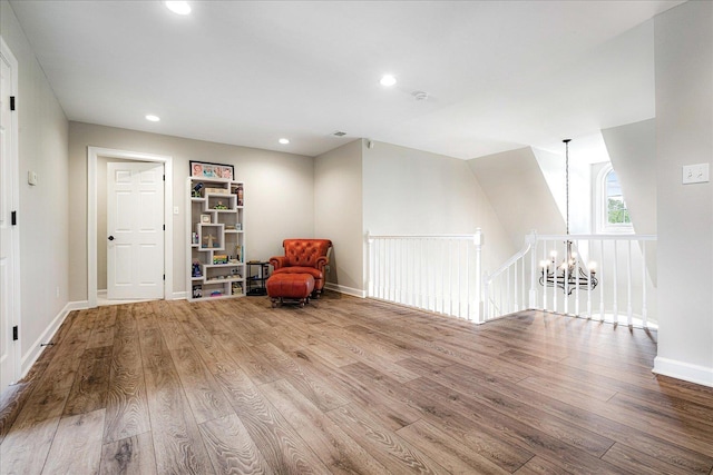 2165 Latting Hills Cv, Eads, TN 38016 - living area featuring a chandelier, wood finished floors, an upstairs landing, and recessed lighting
