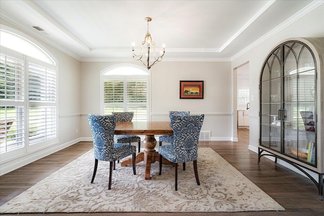 2165 Latting Hills Cv, Eads, TN 38016 - dining room with a chandelier, a tray ceiling, and dark wood finished floors