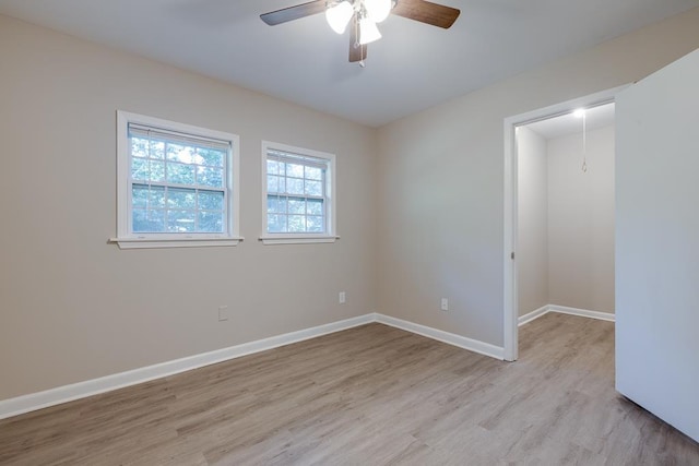 3292 Stella St, Memphis, TN 38127 - unfurnished room featuring light wood-style floors and a ceiling fan