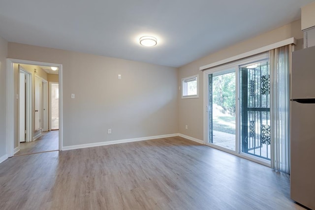 3292 Stella St, Memphis, TN 38127 - unfurnished room with light wood-style floors and baseboards