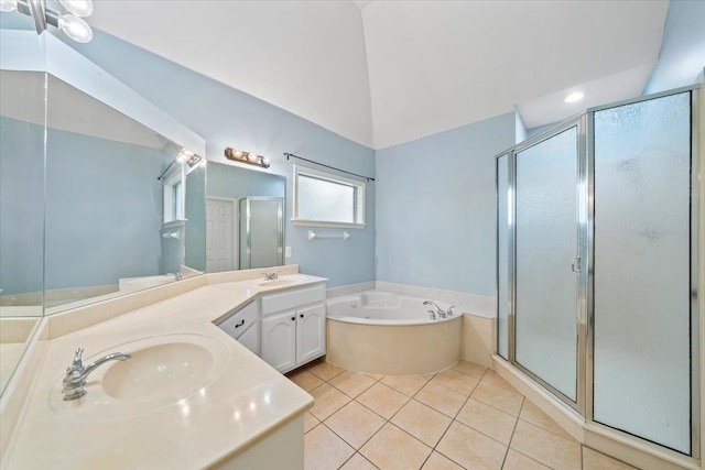 3760 Broadway Rd, Bartlett, TN 38135 - full bath featuring a garden tub, double vanity, a shower stall, tile patterned floors, and lofted ceiling