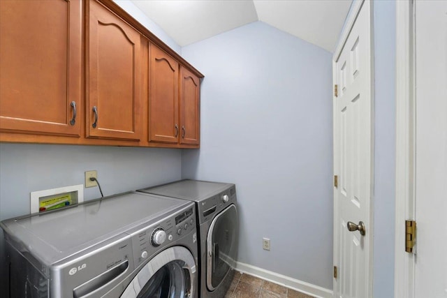 3760 Broadway Rd, Bartlett, TN 38135 - laundry room with cabinet space, washer and dryer, and dark tile patterned floors