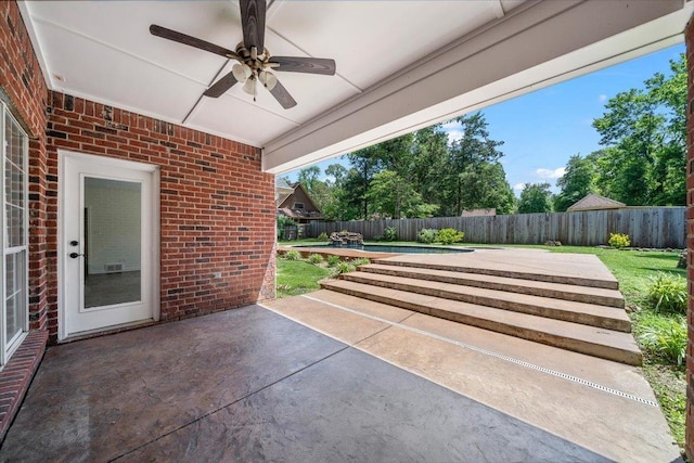 3760 Broadway Rd, Bartlett, TN 38135 - fenced backyard with a patio and a ceiling fan