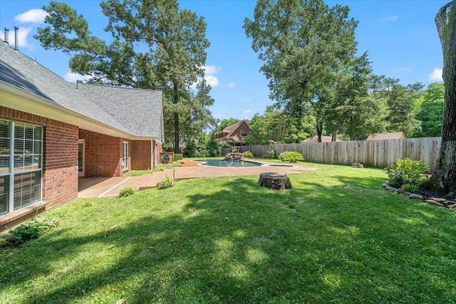 3760 Broadway Rd, Bartlett, TN 38135 - fenced backyard with a patio and an outdoor fire pit