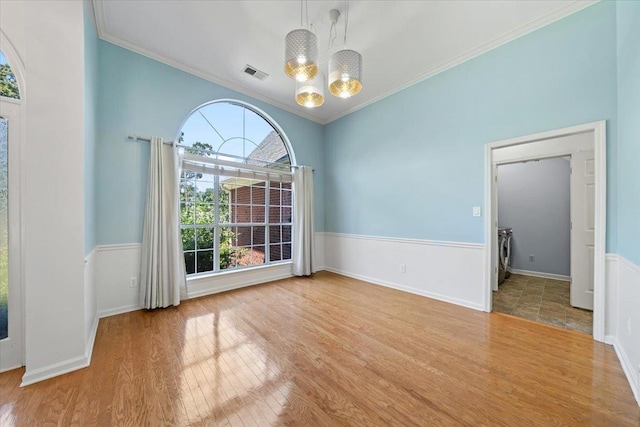 3760 Broadway Rd, Bartlett, TN 38135 - empty room with a chandelier, wood finished floors, and ornamental molding