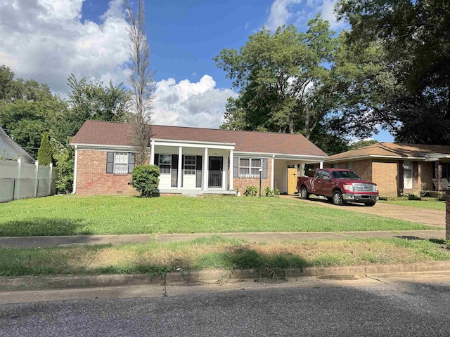 2886 Dearing Cv, Memphis, TN 38118 - ranch-style house with driveway, brick siding, and a carport