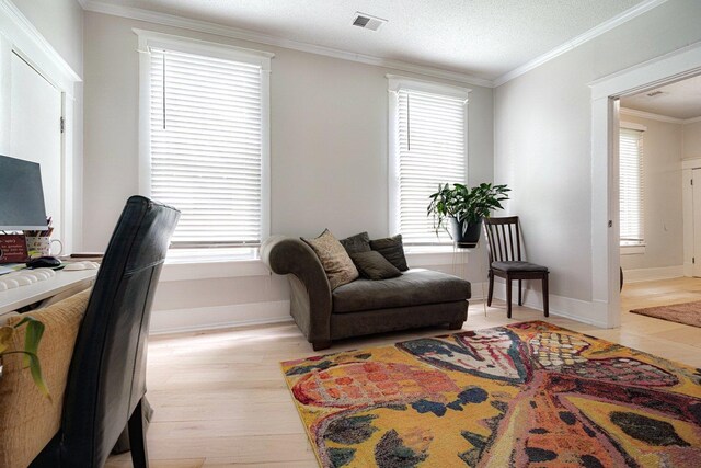 569 Lundee Pl, Memphis, TN 38111 - home office featuring light wood-type flooring, plenty of natural light, and ornamental molding