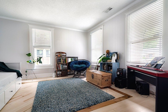 569 Lundee Pl, Memphis, TN 38111 - bedroom featuring ornamental molding, wood finished floors, a textured ceiling, and a desk
