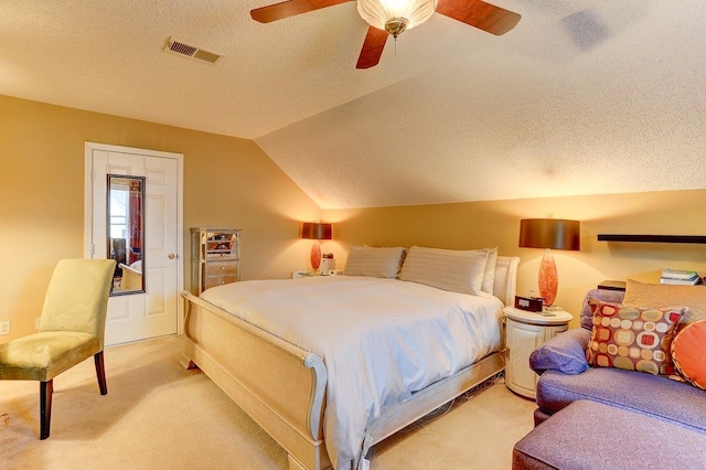 3365 Harrell Rd, Tn, TN 38002 - bedroom featuring light carpet, a textured ceiling, vaulted ceiling, and a ceiling fan
