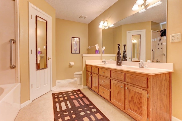 3365 Harrell Rd, Tn, TN 38002 - bathroom featuring double vanity, a shower, a tub, and a textured ceiling