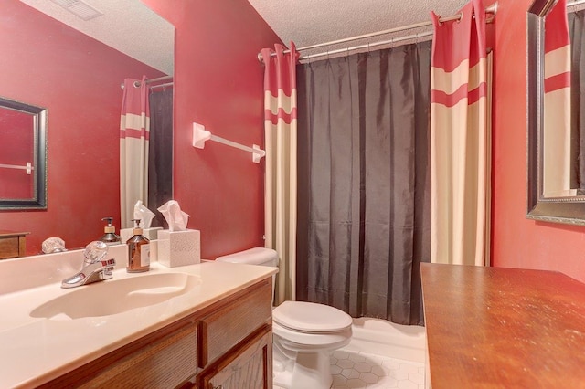 3365 Harrell Rd, Tn, TN 38002 - bathroom featuring vanity, a textured ceiling, curtained shower, and tile patterned flooring