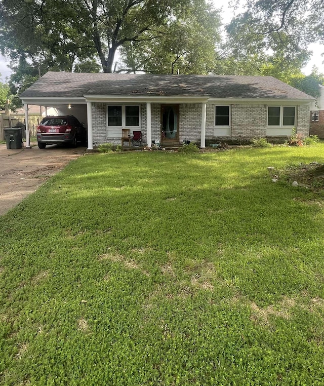 5128 Jessie Lee Ln, Memphis, TN 38118 - single story home featuring concrete driveway, brick siding, a front yard, and a carport