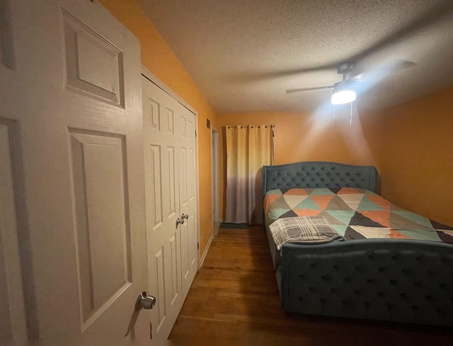 5128 Jessie Lee Ln, Memphis, TN 38118 - bedroom featuring wood finished floors, a textured ceiling, and a ceiling fan