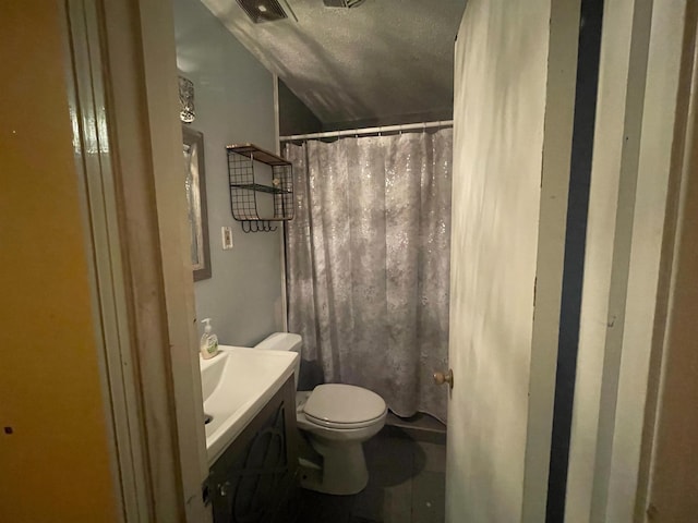 5128 Jessie Lee Ln, Memphis, TN 38118 - bathroom with a textured ceiling, a shower with shower curtain, and vanity