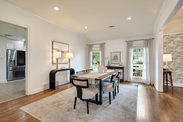 3846 Mimosa Ave, Memphis, TN 38111 - dining area with crown molding, light wood-type flooring, and recessed lighting