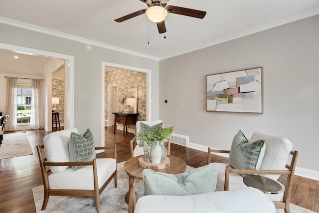 3846 Mimosa Ave, Memphis, TN 38111 - living room featuring a ceiling fan, ornamental molding, and wood finished floors