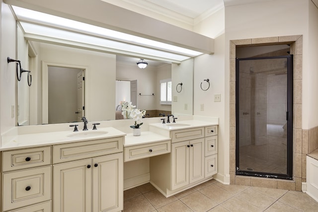 3846 Mimosa Ave, Memphis, TN 38111 - bathroom featuring crown molding, double vanity, a shower stall, and tile patterned floors