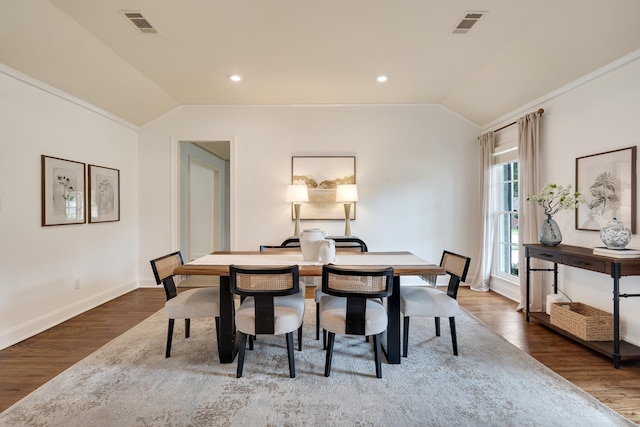 3846 Mimosa Ave, Memphis, TN 38111 - dining area with lofted ceiling, wood finished floors, ornamental molding, and recessed lighting