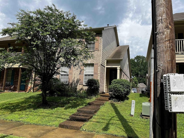 1182 Collierville-Arlington Rd, Collierville, TN 38017 - view of front of home featuring a front yard and brick siding