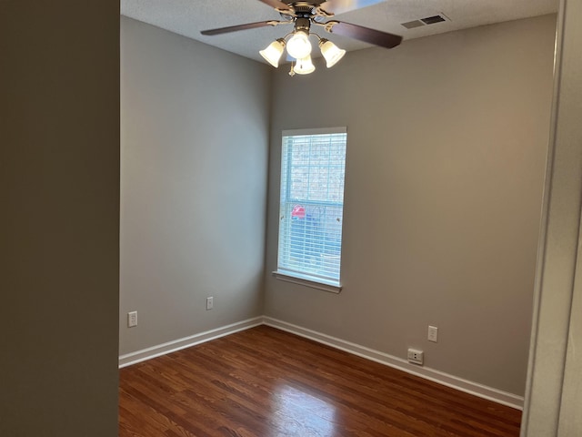 1182 Collierville-Arlington Rd, Collierville, TN 38017 - unfurnished room with dark wood-type flooring and a ceiling fan