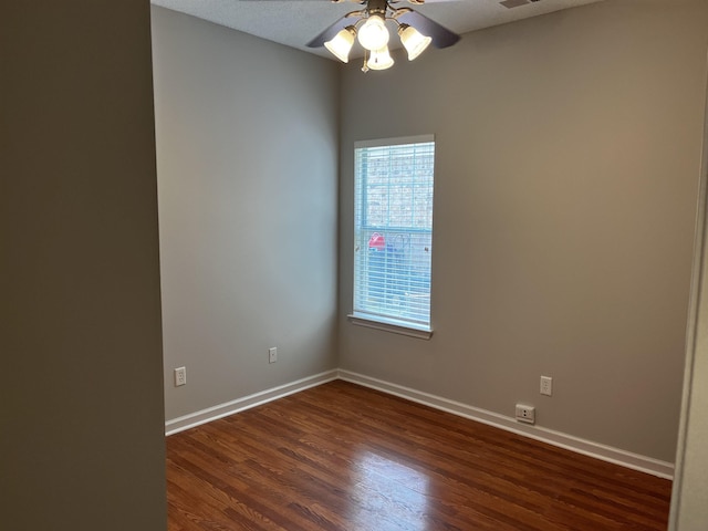 1182 Collierville-Arlington Rd, Collierville, TN 38017 - empty room with dark wood-style floors and a ceiling fan