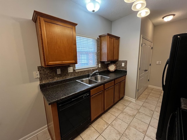 1182 Collierville-Arlington Rd, Collierville, TN 38017 - kitchen featuring black appliances, decorative backsplash, dark countertops, brown cabinets, and a textured ceiling
