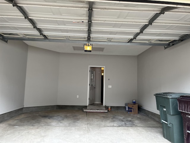 1182 Collierville-Arlington Rd, Collierville, TN 38017 - garage featuring a garage door opener and baseboards