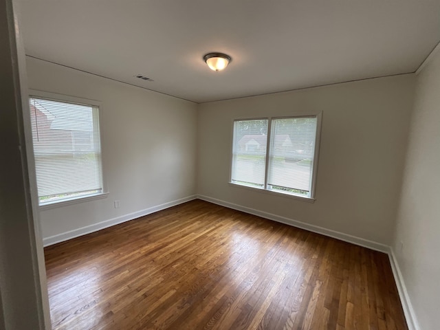 1454 Railton Rd, Memphis, TN 38111 - empty room with hardwood / wood-style flooring and baseboards