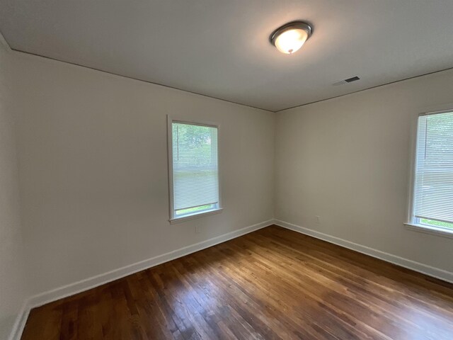 1454 Railton Rd, Memphis, TN 38111 - unfurnished room featuring dark wood-style floors and baseboards