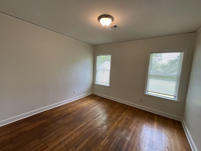 1454 Railton Rd, Memphis, TN 38111 - spare room with dark wood-type flooring and baseboards
