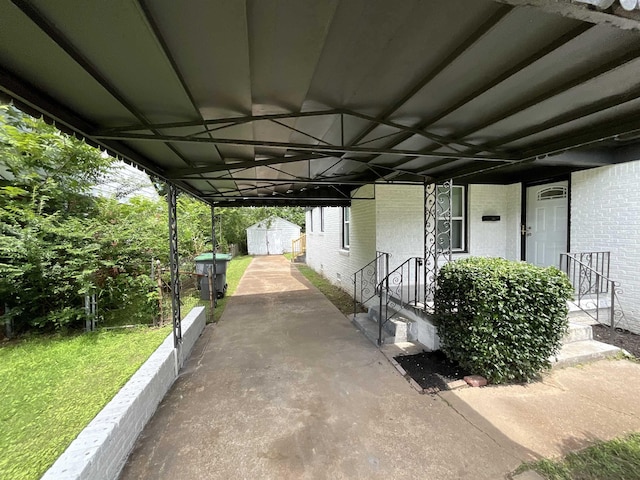 1454 Railton Rd, Memphis, TN 38111 - view of patio featuring a storage shed