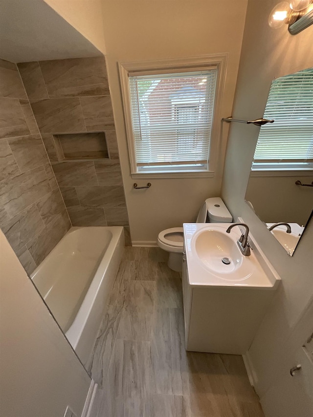 1454 Railton Rd, Memphis, TN 38111 - bathroom featuring vanity, marble look tiles, and bathtub / shower combination