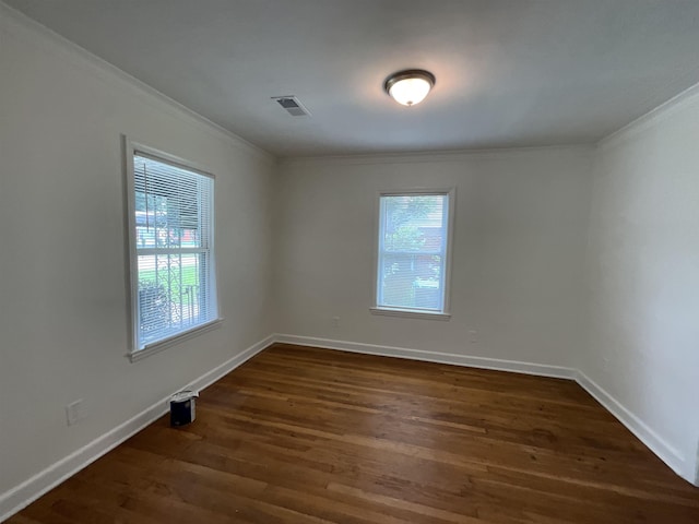 1454 Railton Rd, Memphis, TN 38111 - empty room with ornamental molding, healthy amount of natural light, and dark wood-style flooring