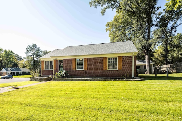 1500 Wheaton St, Memphis, TN 38117 - view of front of property with brick siding and a shingled roof