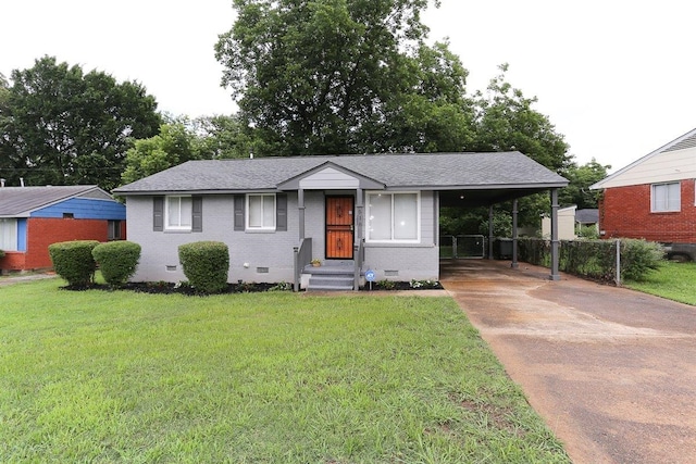 518 Jenson Rd, Memphis, TN 38109 - view of front of property featuring crawl space, concrete driveway, an attached carport, a shingled roof, and brick siding