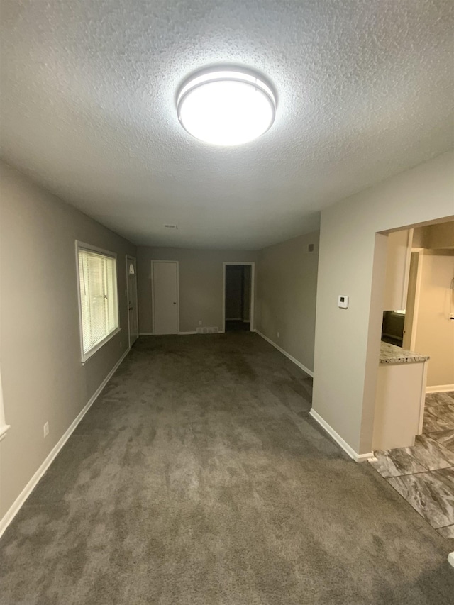 3560 Steele St, Memphis, TN 38127 - carpeted empty room featuring a textured ceiling