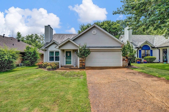 2651 Bay Pointe Cir W, Memphis, TN 38128 - single story home featuring a chimney, a garage, concrete driveway, and a front lawn