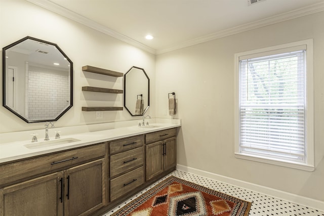 3613 Charleswood Ave, Memphis, TN 38122 - bathroom featuring double vanity, plenty of natural light, and ornamental molding