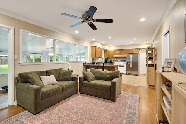 4152 Barfield Rd, Memphis, TN 38117 - living room with crown molding, a ceiling fan, light wood-type flooring, and recessed lighting