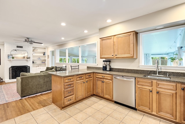 4152 Barfield Rd, Memphis, TN 38117 - kitchen featuring stainless steel dishwasher, dark stone counters, a peninsula, ceiling fan, and ornamental molding