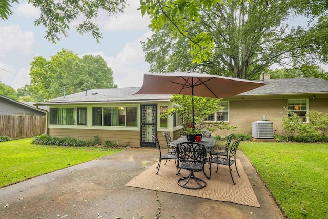 4152 Barfield Rd, Memphis, TN 38117 - back of house featuring a patio, roof with shingles, and outdoor dining space