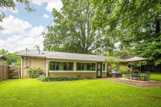 4152 Barfield Rd, Memphis, TN 38117 - back of property featuring a patio, a gate, and a chimney