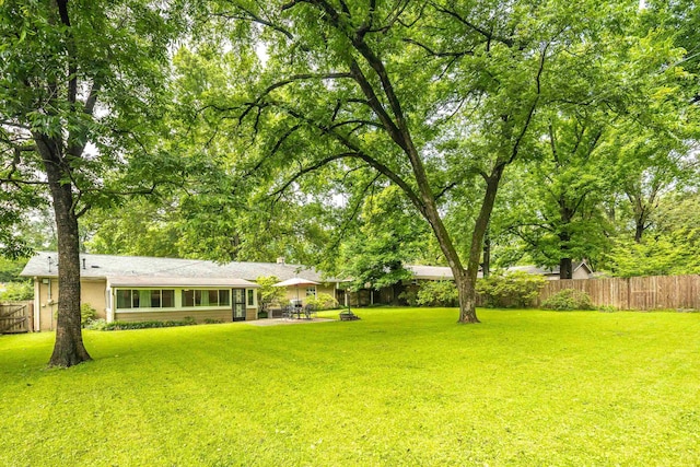 4152 Barfield Rd, Memphis, TN 38117 - fenced backyard featuring a patio