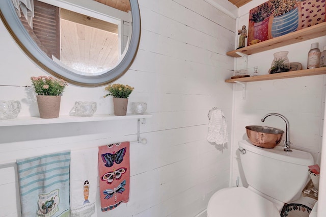 560 S Greer St, Memphis, TN 38111 - half bathroom with toilet and wood walls