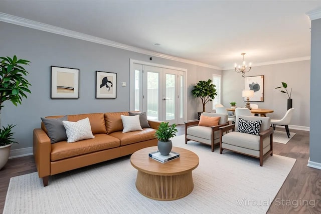 6942 Amberly Rd Unit 6942, Memphis, TN 38119 - living room with wood finished floors, a chandelier, crown molding, and french doors