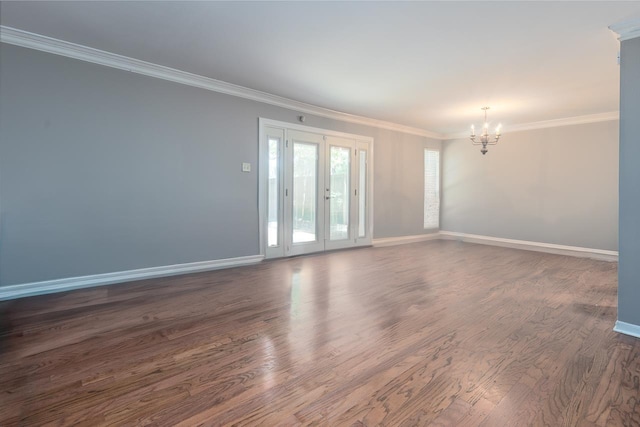 6942 Amberly Rd Unit 6942, Memphis, TN 38119 - spare room with a chandelier, ornamental molding, and dark wood-style flooring