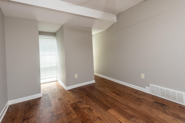 6942 Amberly Rd Unit 6942, Memphis, TN 38119 - unfurnished room featuring baseboards and dark wood-type flooring